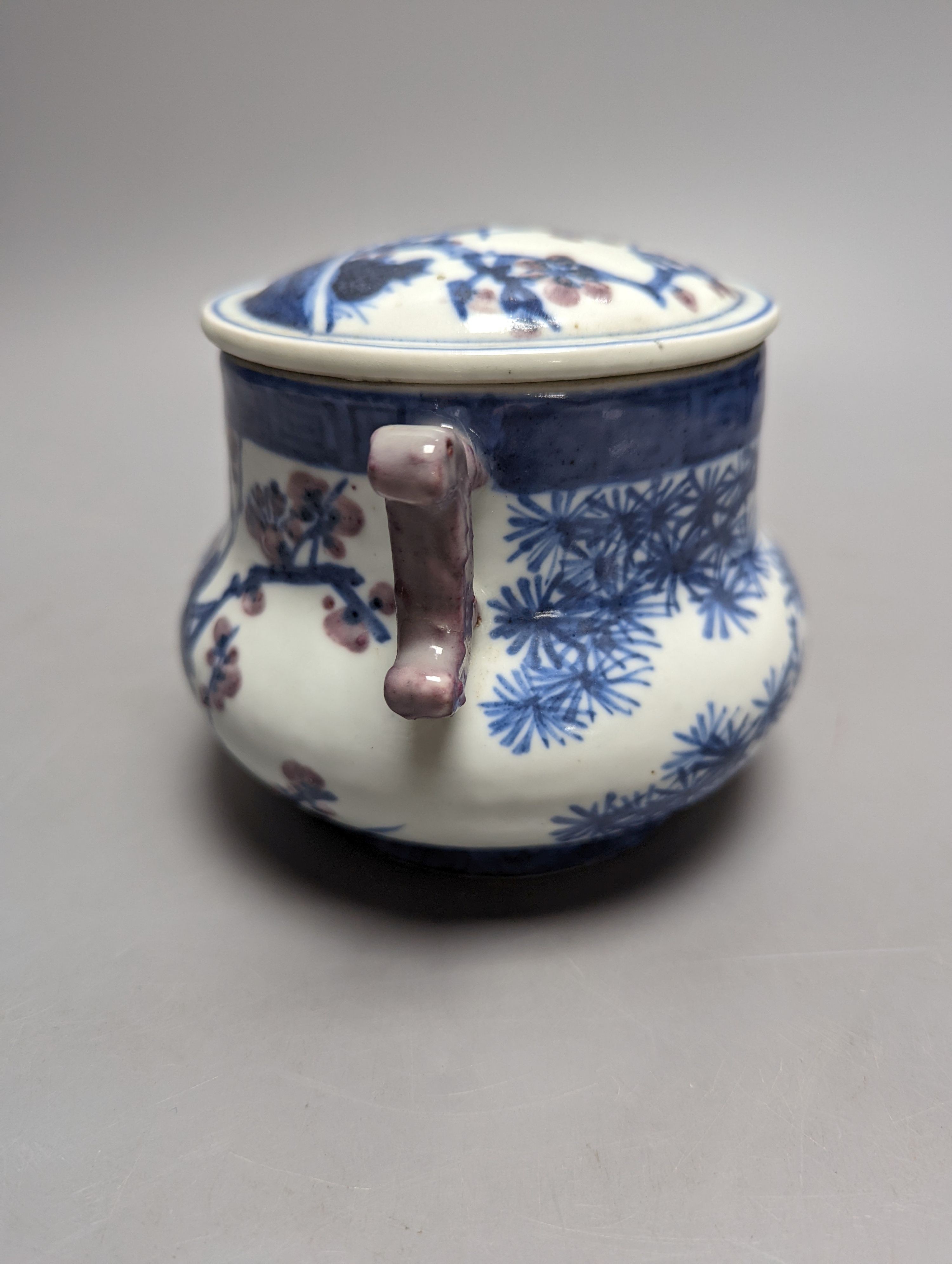 A Chinese underglaze blue and copper red jar and cover, Xuande six character mark but later 12cm
